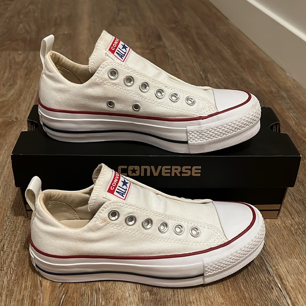 Converse White Canvas Slip-On Low Top Sneakers with Red Trim